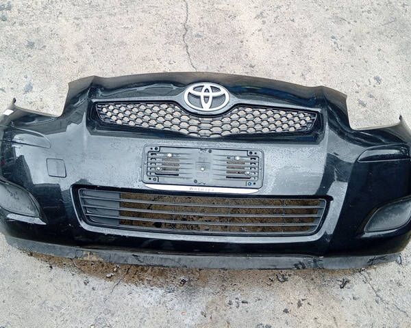 PARAURTI ANTERIORE COMPLETO PER TOYOTA Yaris Serie 521190D340 (08>11)